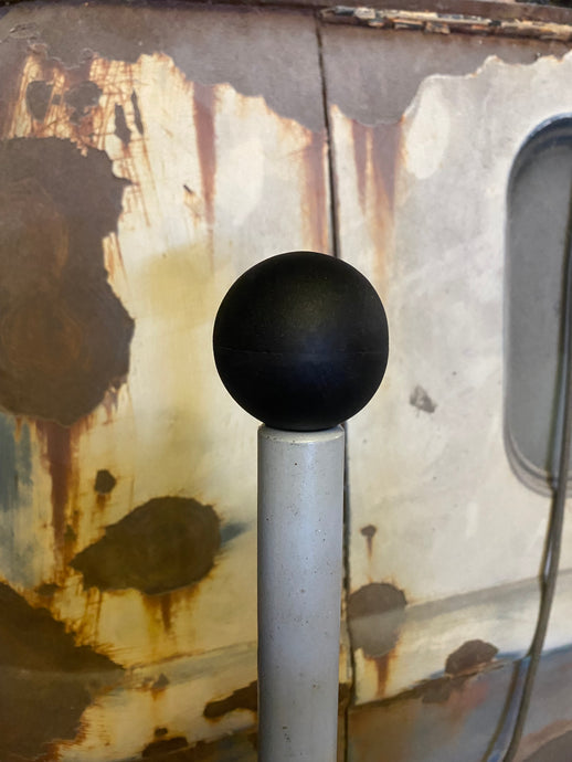 Textured flat black ball